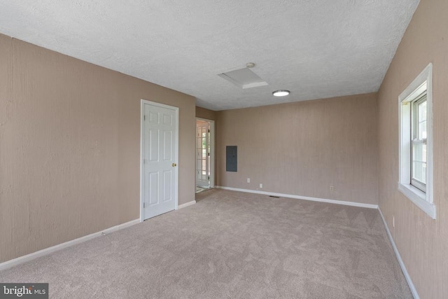 7306 Pullen Dr, Fredericksburg, VA 22407 - carpeted empty room featuring a textured ceiling, electric panel, and baseboards