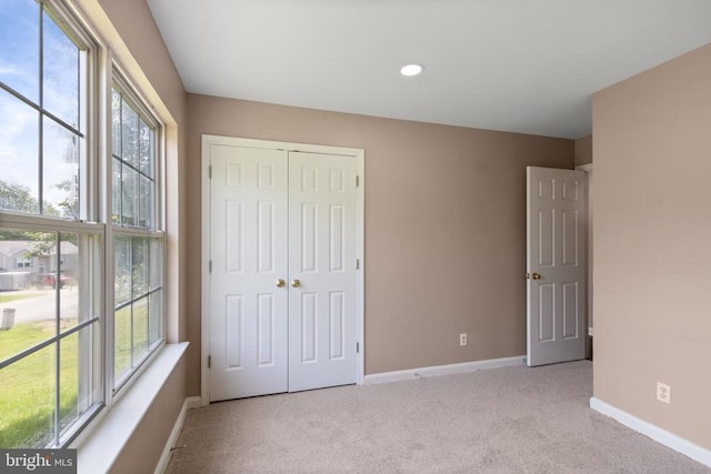 7306 Pullen Dr, Fredericksburg, VA 22407 - unfurnished bedroom with carpet, baseboards, a closet, and recessed lighting