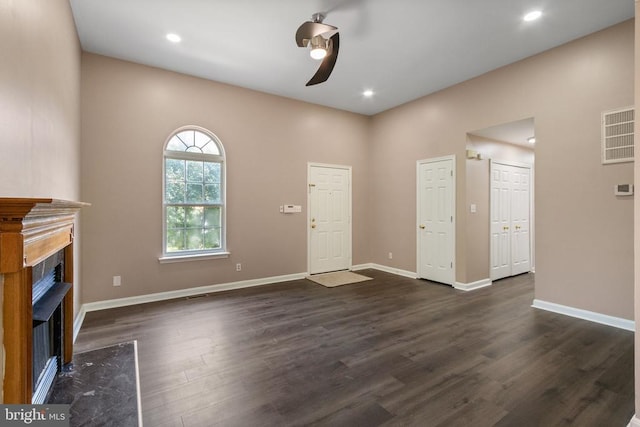 7306 Pullen Dr, Fredericksburg, VA 22407 - unfurnished living room featuring dark wood-style flooring, baseboards, a fireplace, and recessed lighting