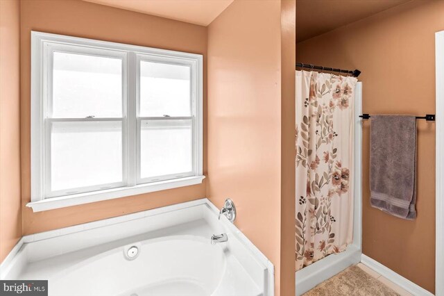 11814 Arbor Glen Dr, Fredericksburg, VA 22407 - bathroom with curtained shower, a bath, and tile patterned flooring