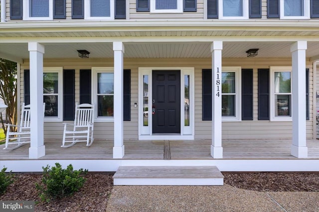 11814 Arbor Glen Dr, Fredericksburg, VA 22407 - doorway to property featuring a porch