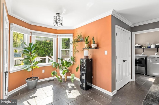 11814 Arbor Glen Dr, Fredericksburg, VA 22407 - exercise room featuring independent washer and dryer, baseboards, a chandelier, and ornamental molding