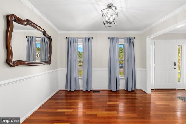 11814 Arbor Glen Dr, Fredericksburg, VA 22407 - foyer entrance featuring wood-type flooring, a chandelier, and ornamental molding