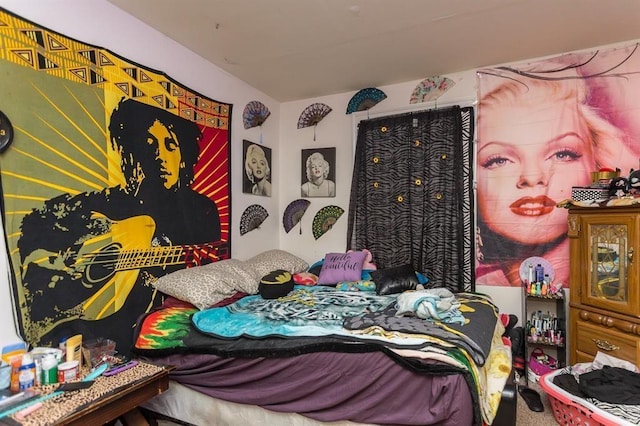 bedroom featuring carpet