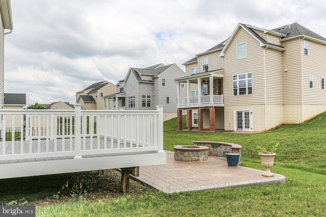 6056 Greenspring Rd, Fredericksburg, VA 22407 - rear view of property with an outdoor fire pit, a lawn, a patio area, a wooden deck, and french doors