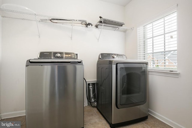 6056 Greenspring Rd, Fredericksburg, VA 22407 - laundry area with independent washer and dryer and baseboards