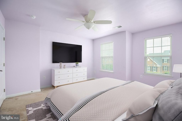 6056 Greenspring Rd, Fredericksburg, VA 22407 - bedroom with light carpet, baseboards, and a ceiling fan