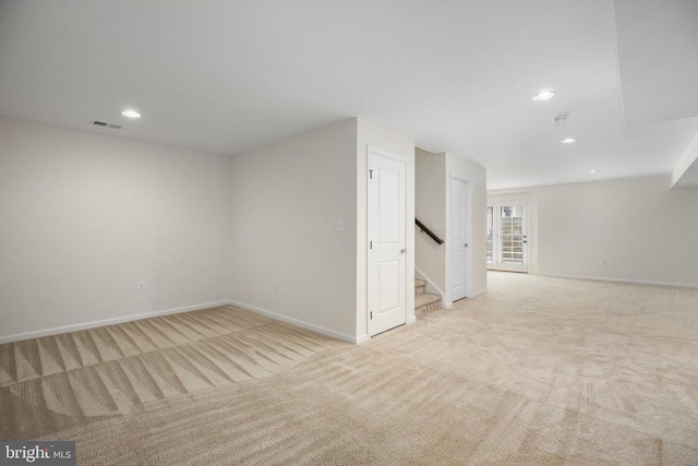 6056 Greenspring Rd, Fredericksburg, VA 22407 - empty room with light colored carpet, baseboards, recessed lighting, and stairs