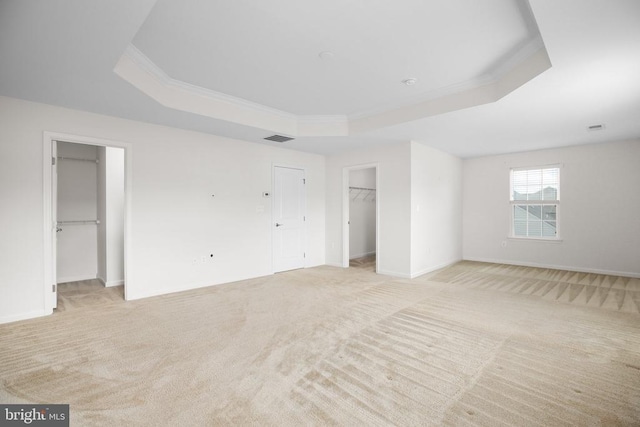 6056 Greenspring Rd, Fredericksburg, VA 22407 - empty room featuring a tray ceiling, light carpet, ornamental molding, and baseboards