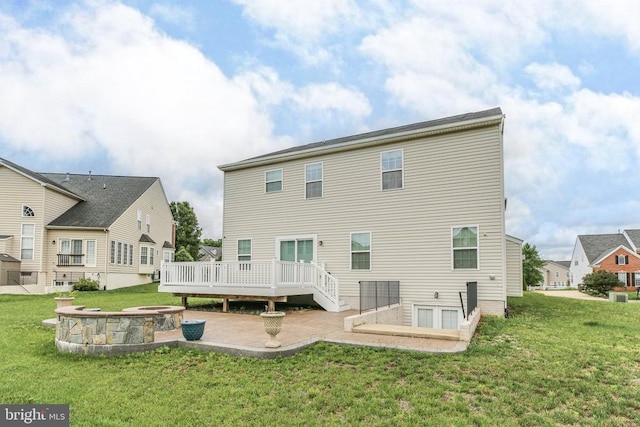 6056 Greenspring Rd, Fredericksburg, VA 22407 - rear view of house featuring a patio, a deck, and a lawn