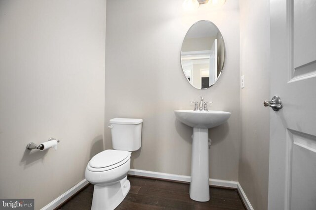 6056 Greenspring Rd, Fredericksburg, VA 22407 - half bath with toilet and wood finished floors