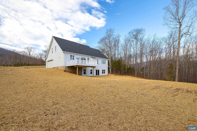 212 Bartholomew Pl, Stanardsville, VA 22973 - rear view of property featuring a deck and a lawn