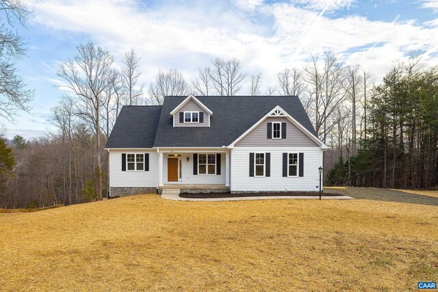 212 Bartholomew Pl, Stanardsville, VA 22973 - cape cod house featuring covered porch and a front yard