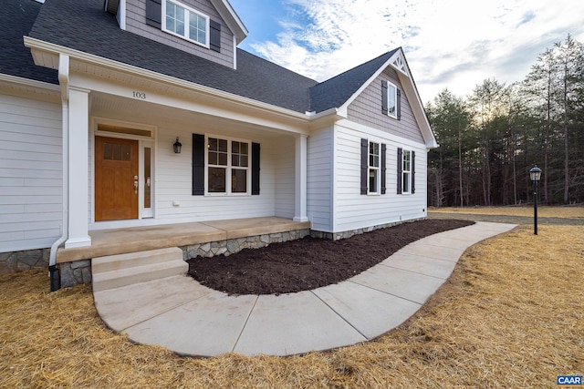 212 Bartholomew Pl, Stanardsville, VA 22973 - view of front of house with a shingled roof and covered porch