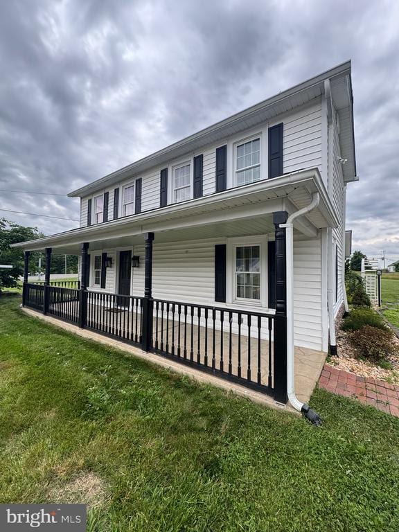 6612 Old Plank Rd, Fredericksburg, VA 22407 - view of front of house featuring covered porch and a front lawn