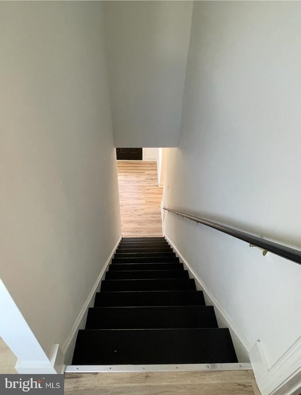 6612 Old Plank Rd, Fredericksburg, VA 22407 - stairs featuring wood finished floors and baseboards