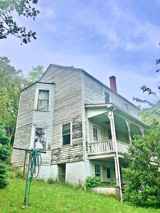 9264 Schuyler Rd, Schuyler, VA 22969 - view of side of home featuring a chimney and a balcony
