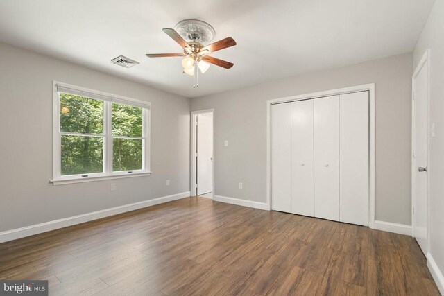 11248 Saint Pauls Rd, Remington, VA 22734 - unfurnished bedroom with wood finished floors, a closet, and ceiling fan