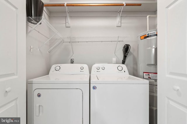 11248 Saint Pauls Rd, Remington, VA 22734 - laundry area featuring water heater and washer and clothes dryer