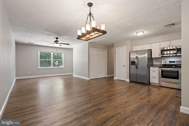 11248 Saint Pauls Rd, Remington, VA 22734 - kitchen featuring appliances with stainless steel finishes, a ceiling fan, dark wood-style floors, white cabinetry, and a textured ceiling
