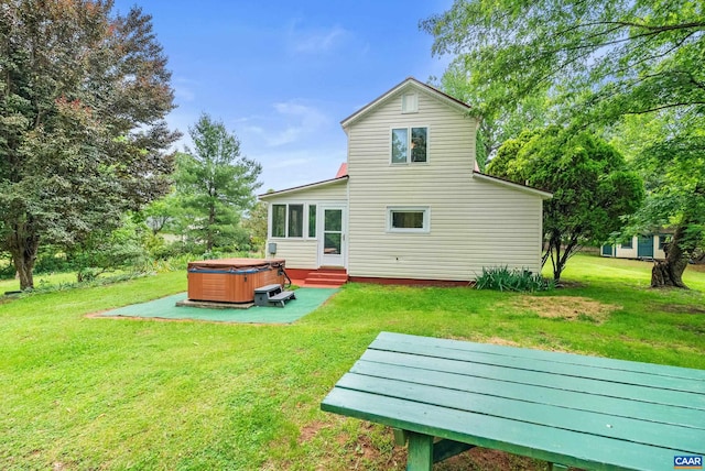 687 Gidsville Rd, Amherst, VA 24521 - rear view of house with a hot tub and a lawn