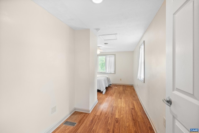 687 Gidsville Rd, Amherst, VA 24521 - corridor with attic access, light wood-style flooring, and baseboards