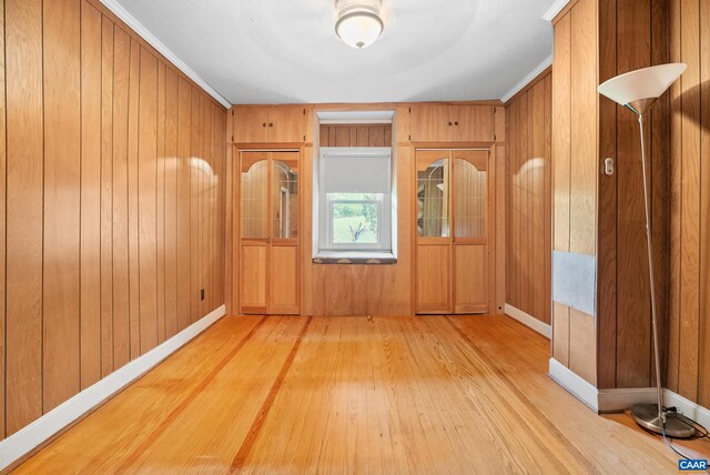 687 Gidsville Rd, Amherst, VA 24521 - spare room with hardwood / wood-style flooring, baseboards, and wooden walls