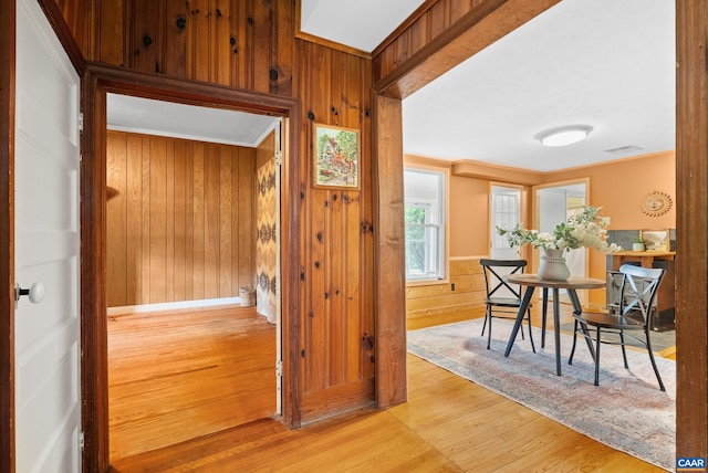 687 Gidsville Rd, Amherst, VA 24521 - hall featuring wood finished floors, wooden walls, and ornamental molding