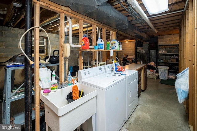 127 Gold Rush Dr, Locust Grove, VA 22508 - unfinished basement featuring separate washer and dryer, a sink, and concrete block wall