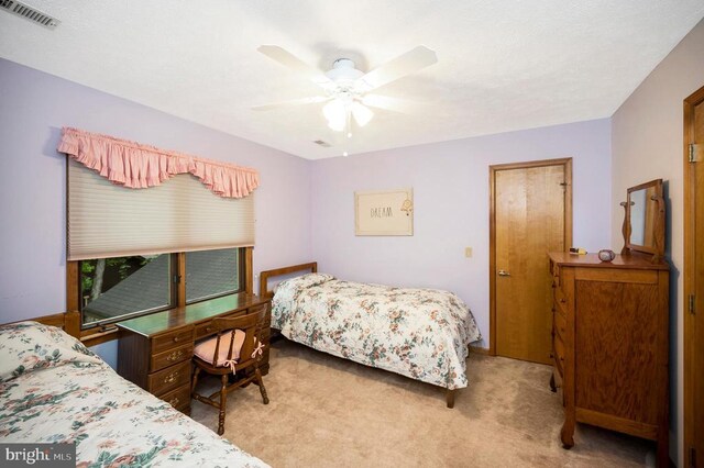 127 Gold Rush Dr, Locust Grove, VA 22508 - carpeted bedroom with a ceiling fan