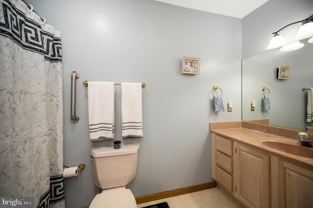 127 Gold Rush Dr, Locust Grove, VA 22508 - full bathroom with vanity, toilet, and baseboards