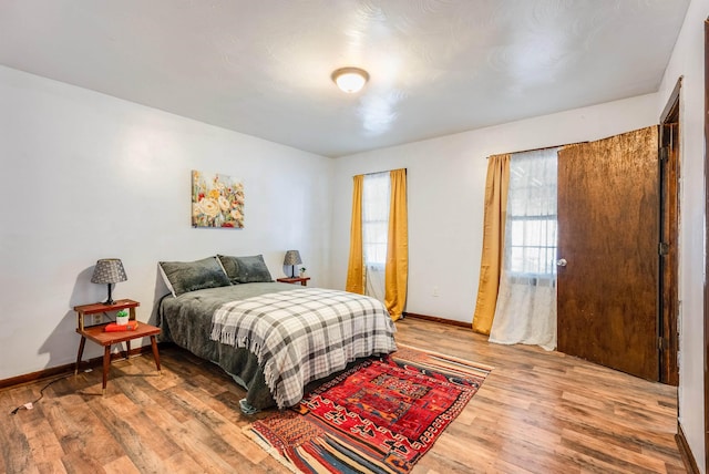 bedroom featuring hardwood / wood-style floors