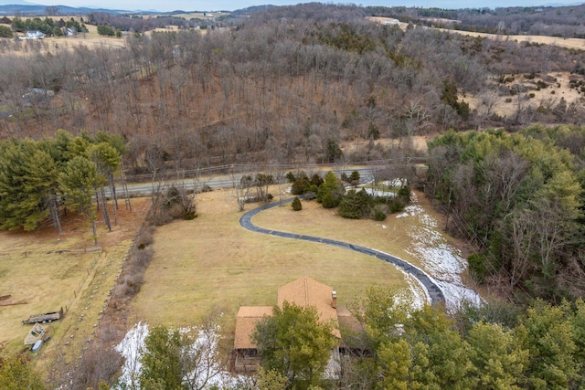 birds eye view of property with a rural view