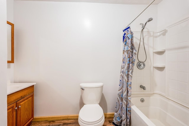 full bathroom featuring vanity, wood-type flooring, shower / bath combination with curtain, and toilet