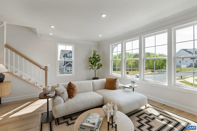 43 Farrow Cir, Charlottesville, VA 22901 - living room featuring plenty of natural light, stairs, light wood-style flooring, baseboards, and ornamental molding