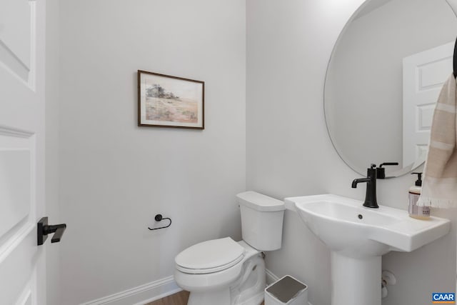 43 Farrow Cir, Charlottesville, VA 22901 - bathroom with toilet, baseboards, and wood finished floors