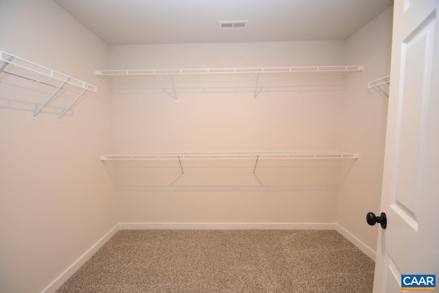 560 Amick Rd Amick B, Unit Amick B, Louisa, VA 23093 - bathroom with a stall shower, marble finish floor, baseboards, and a sink