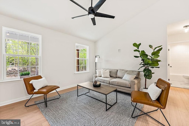 5903 Stubbs Bridge Rd, Mineral, VA 23117 - living area with ceiling fan, light wood-type flooring, vaulted ceiling, and baseboards