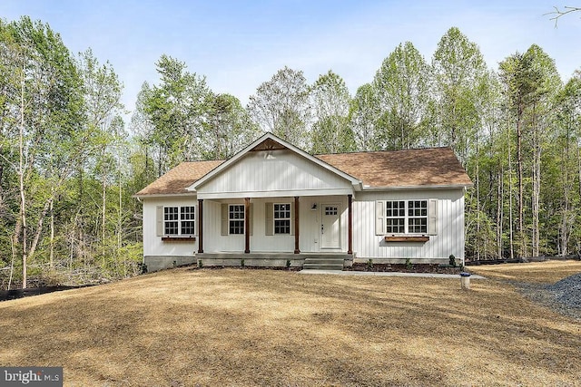 5903 Stubbs Bridge Rd, Mineral, VA 23117 - modern farmhouse style home with a porch and a shingled roof