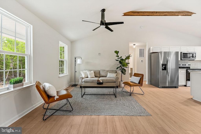 5903 Stubbs Bridge Rd, Mineral, VA 23117 - living room featuring ceiling fan, light wood finished floors, vaulted ceiling, and baseboards