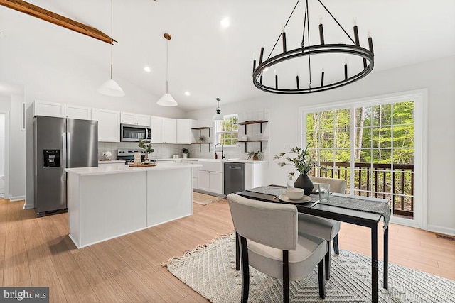 5903 Stubbs Bridge Rd, Mineral, VA 23117 - dining area with light wood finished floors, recessed lighting, and high vaulted ceiling