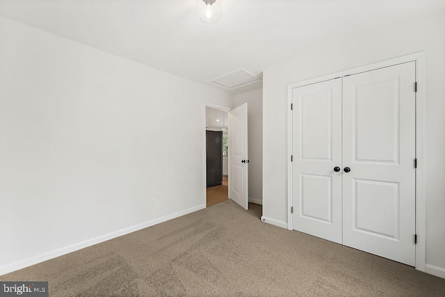 5903 Stubbs Bridge Rd, Mineral, VA 23117 - unfurnished bedroom featuring carpet floors, attic access, and baseboards