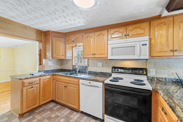 887 Natural Chimneys Rd, Mount Solon, VA 22843 - kitchen with white appliances, a sink, tasteful backsplash, a peninsula, and a textured ceiling