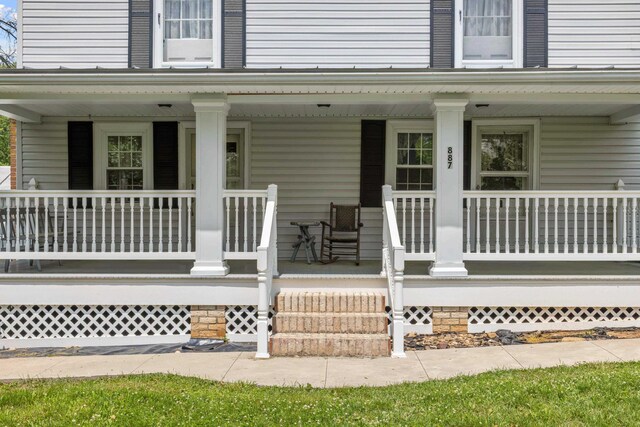 887 Natural Chimneys Rd, Mount Solon, VA 22843 - doorway to property featuring covered porch