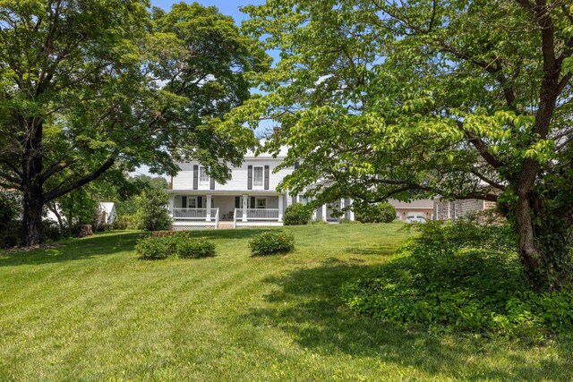 887 Natural Chimneys Rd, Mount Solon, VA 22843 - view of green lawn with a porch