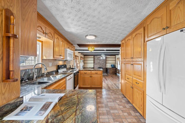 887 Natural Chimneys Rd, Mount Solon, VA 22843 - kitchen with white appliances, a sink, a peninsula, brick patterned flooring, and a textured ceiling