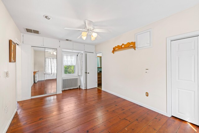887 Natural Chimneys Rd, Mount Solon, VA 22843 - unfurnished bedroom featuring radiator, hardwood / wood-style flooring, baseboards, and ceiling fan