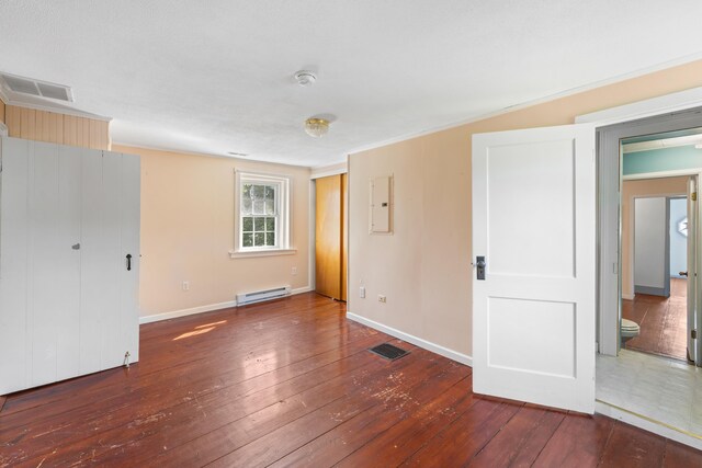 887 Natural Chimneys Rd, Mount Solon, VA 22843 - unfurnished bedroom with a baseboard radiator, electric panel, wood-type flooring, and baseboards
