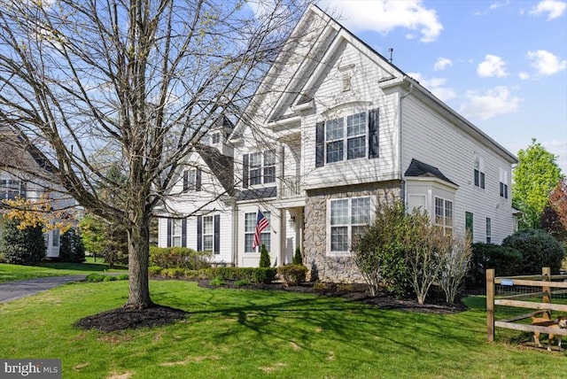  - traditional-style house with stone siding