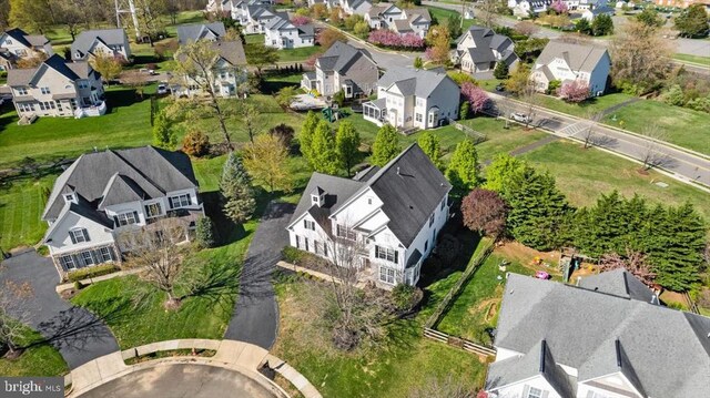  - aerial view of property's location with nearby suburban area
